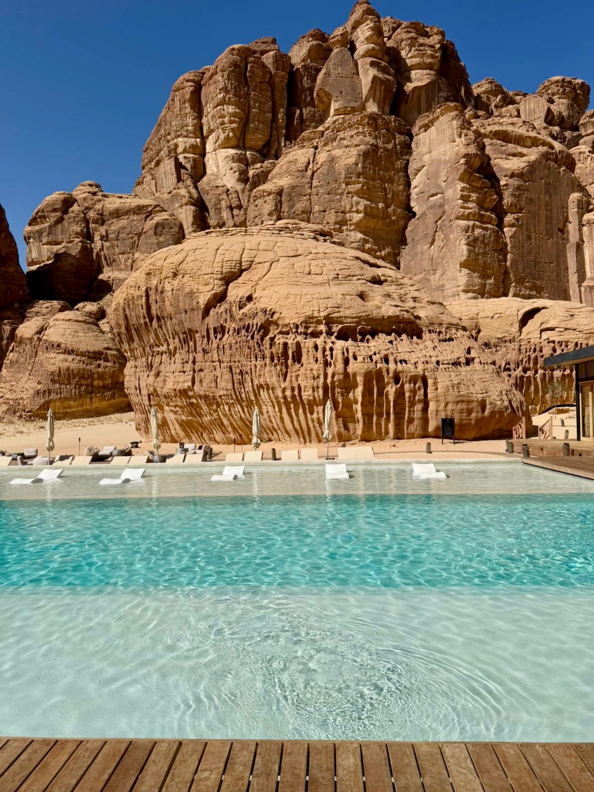 AlUla pool with desert rock