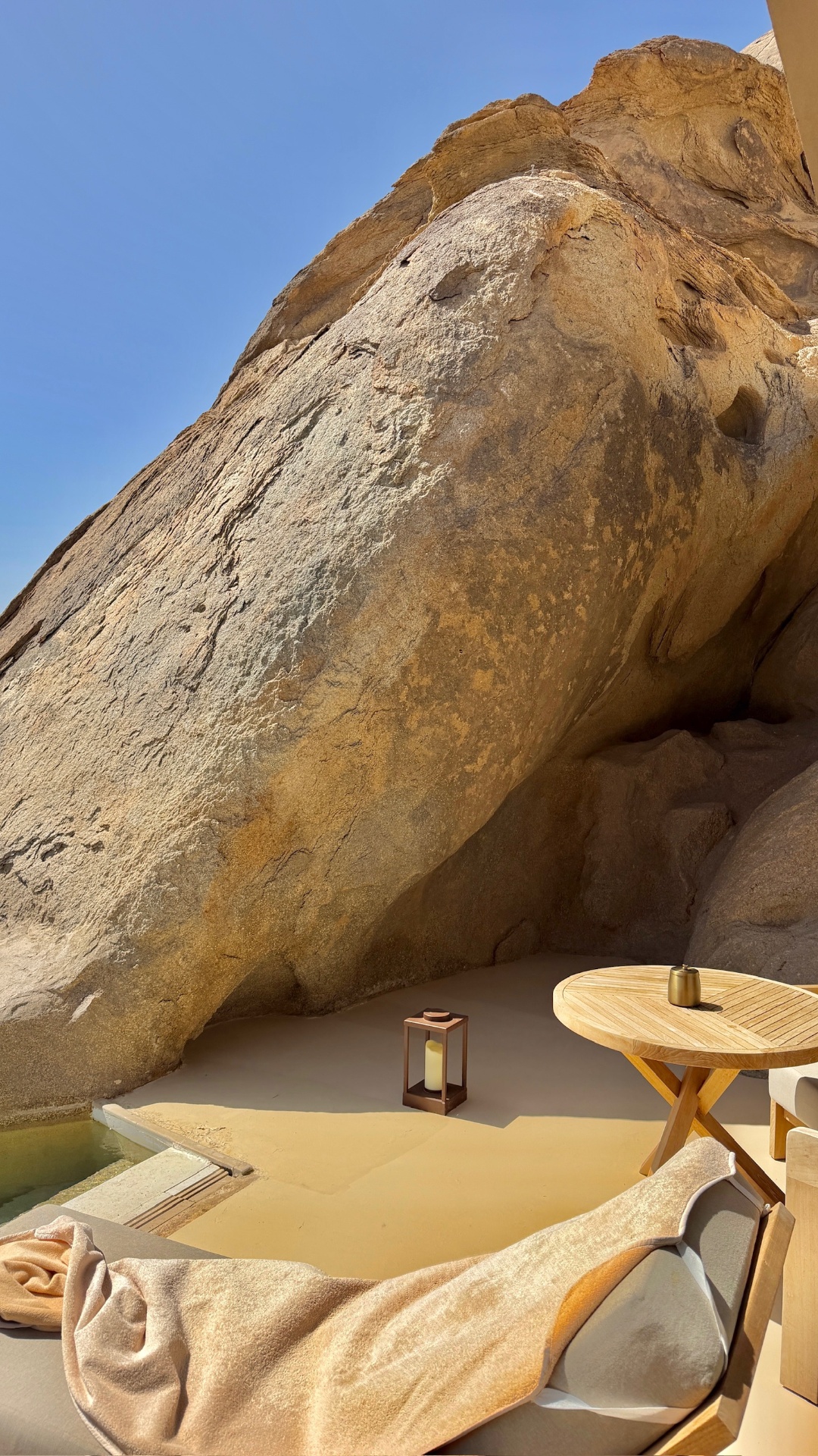 Lantern beside desert rock